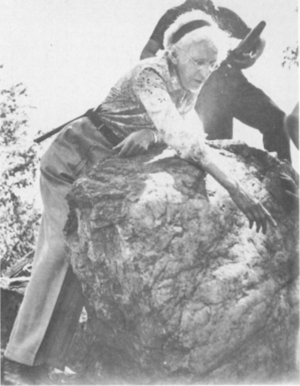 Alice Wilson in the field, instructing other geologists